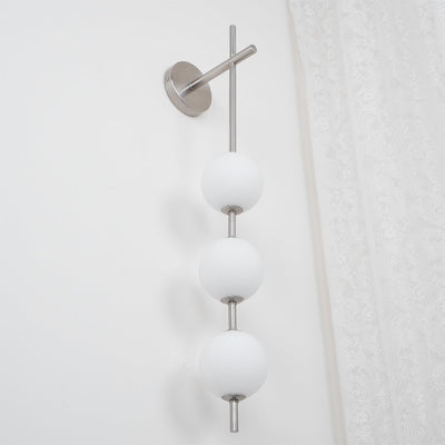 Applique Murale Verticale en Globe de Verre – Éclairage Élégant et Moderne